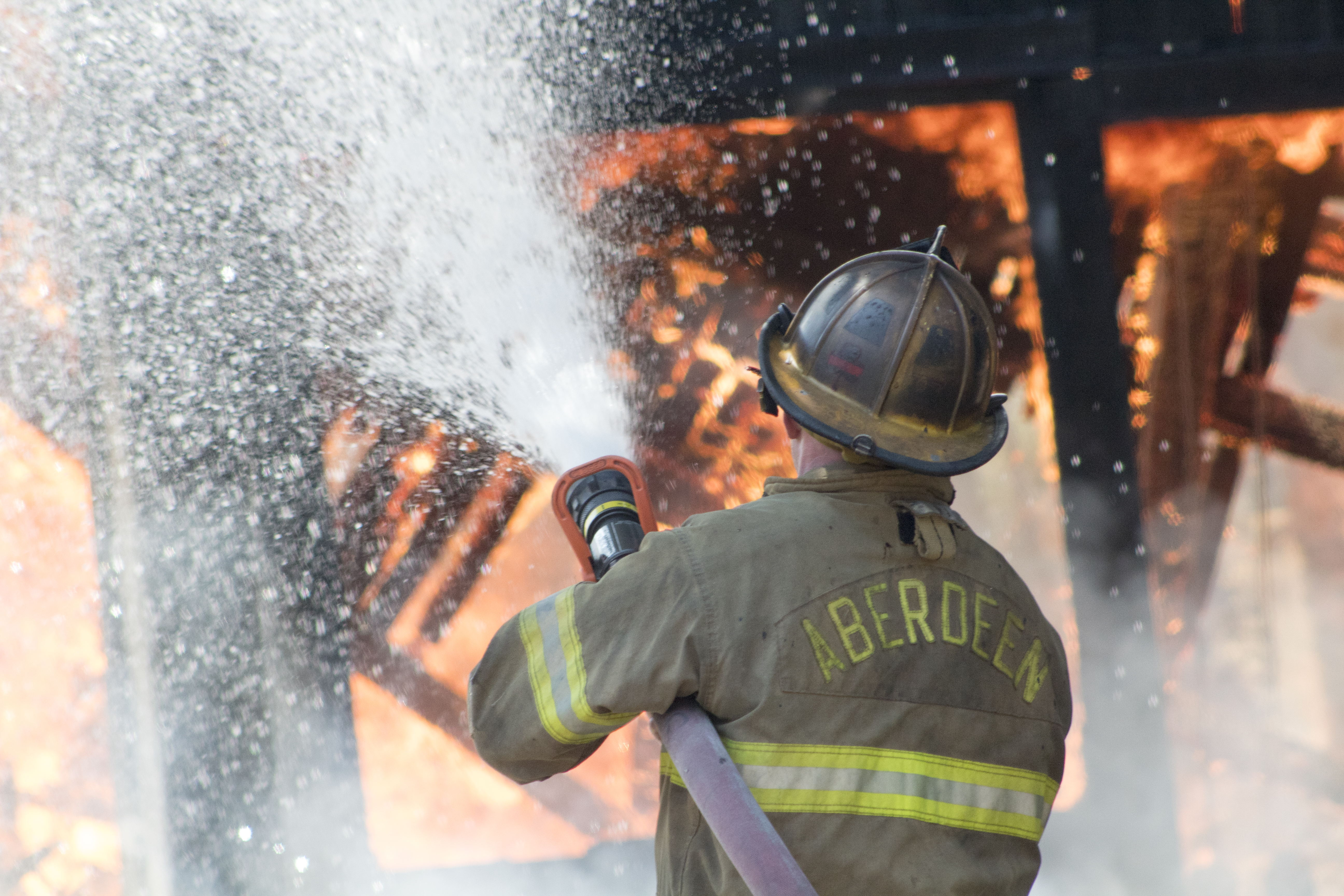 Aberdeen Firefighter Douses Burning Building